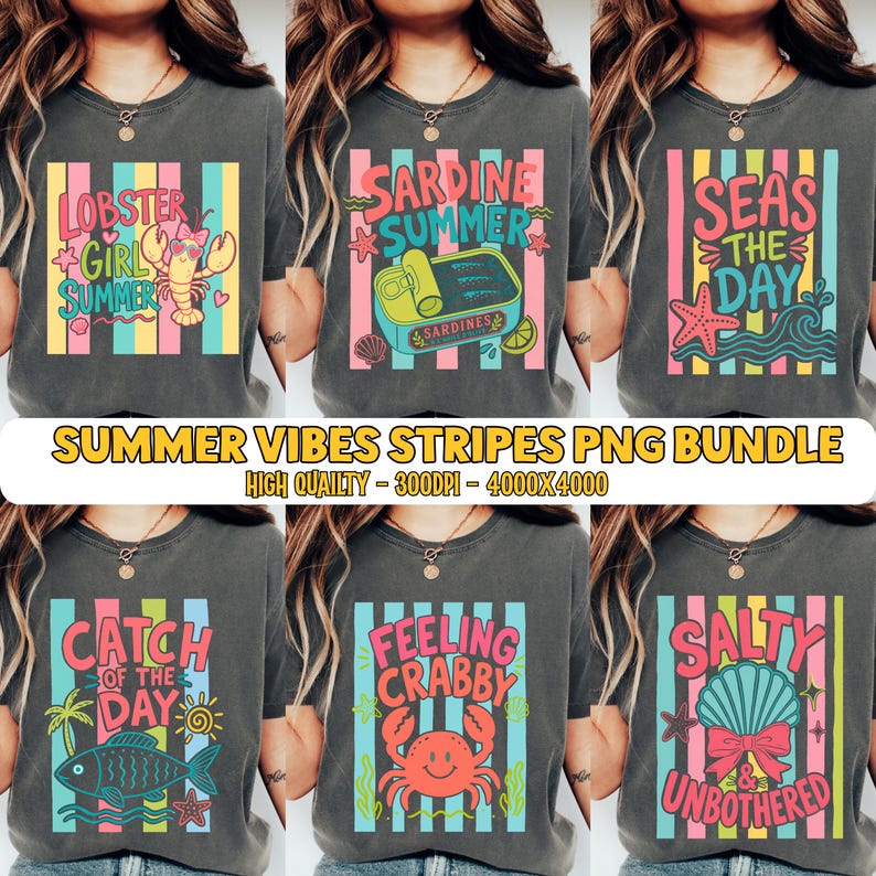May include: A collection of six charcoal gray t-shirts featuring colorful graphic prints with vertical stripes and summer-themed text including Lobster Girl Summer, Sardine Summer, Seas The Day, Catch Of The Day, Feeling Crabby, and Salty Unbothered.