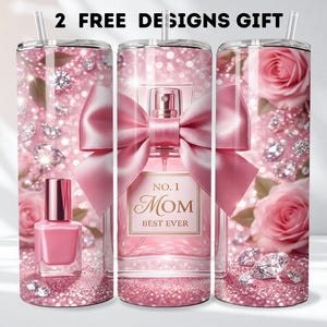 May include: A set of three pink glitter tumblers with a floral and diamond design. One tumbler features a perfume bottle with a pink bow and the text "NO. 1 MOM BEST EVER". Another tumbler has a nail polish bottle. The text "2 FREE DESIGNS GIFT" is at the top.
