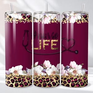 May include: A maroon tumbler with a floral and leopard print design. The tumbler features the words "Nurse LIFE" in gold lettering, a stethoscope graphic, and white flowers.