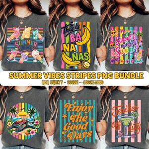 May include: A collection of six charcoal gray t-shirts featuring various colorful graphic prints including summer cocktails, bananas with the text This is BANANAS, School's out for Summer, a sea turtle on a beach, Enjoy the Good Days, and Teacher off duty.