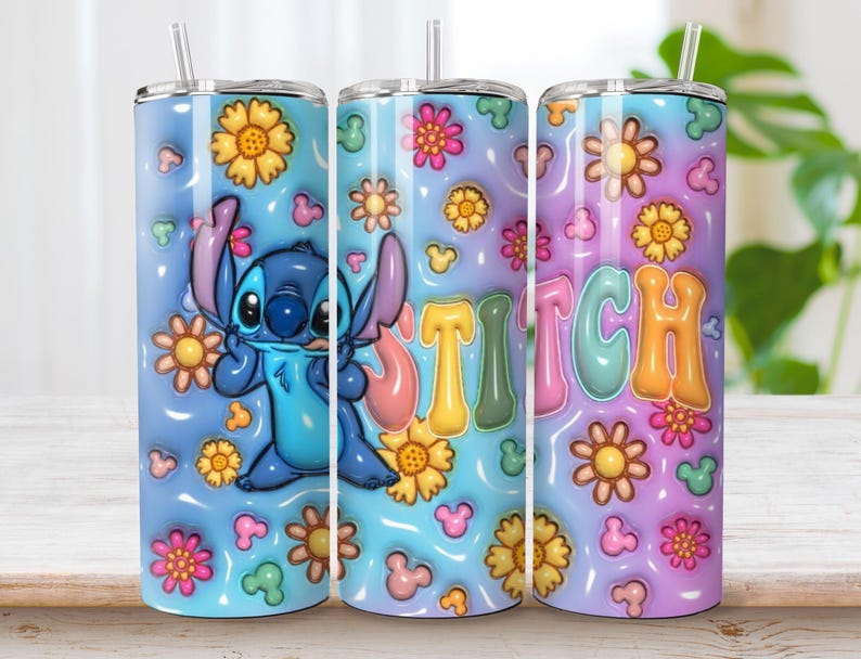May include: A cylindrical tumbler with a clear straw featuring a blue character with large ears, yellow and pink flowers, and small mouse-shaped icons on a blue and purple gradient background. The word STITCH is printed in large, colorful letters.