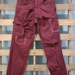 Alexander Lee chang pants nice design top designer brand maroon colour size 31
