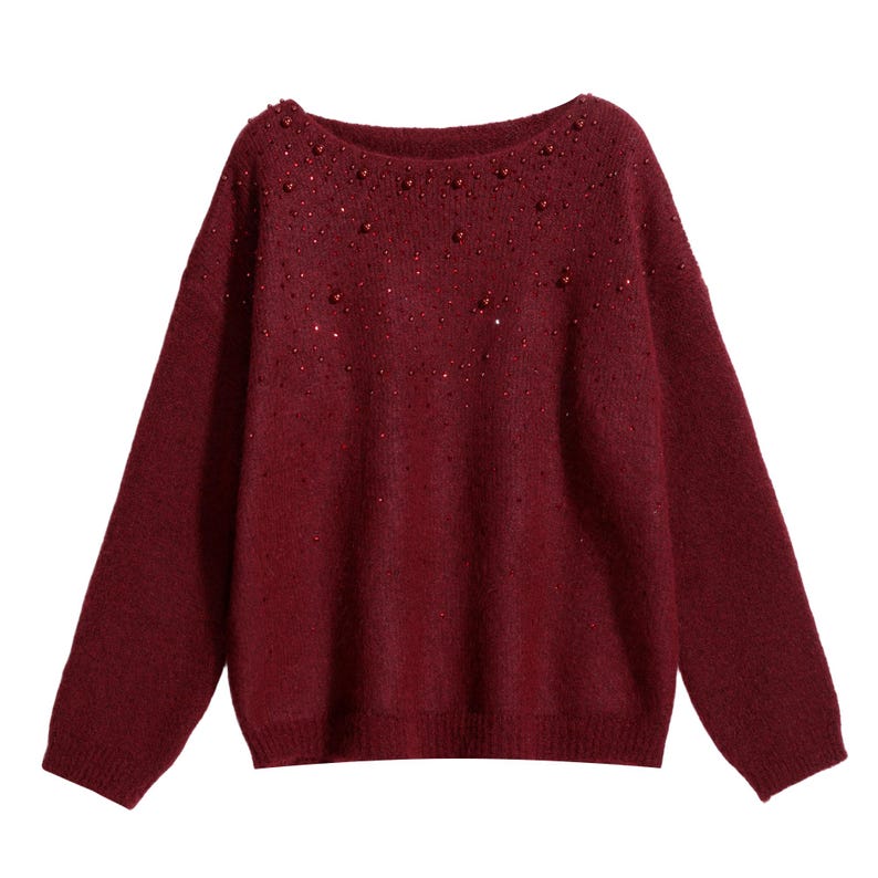 A burgundy-colored knitted sweater with small red beads or sequins scattered across the front.