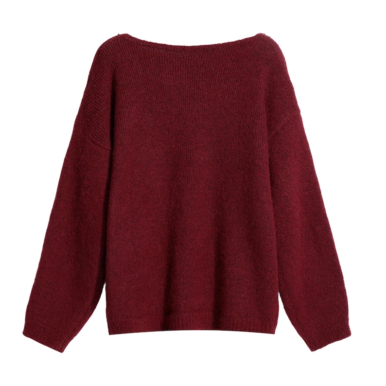 A burgundy-colored knitted sweater with long sleeves and a high neckline.