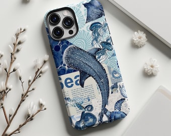 May include: A phone case featuring a blue and white collage of marine life including a whale shark, jellyfish, sea turtles, and stingrays. The design incorporates text snippets and abstract patterns in shades of navy and light blue.
