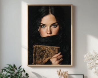 May include: A framed portrait of a woman with dark hair and striking blue eyes, partially obscured by a black garment. She holds a vintage book with gold detailing. The image is displayed above a wooden bench with plants and decorative items.