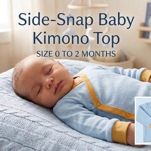 May include: A light blue long-sleeve baby kimono top with mustard yellow trim and side-snap closures. The garment is labelled for size 0 to 2 months. The design features a wrap-front style with long sleeves and contrasting cuffs in a solid colour.