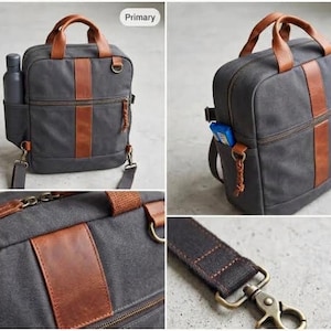 May include: A charcoal gray canvas bag with brown leather accents, featuring two top handles, a front zippered pocket, side pockets for a bottle, and a detachable shoulder strap with a brass-toned metal swivel hook and reinforced stitching.