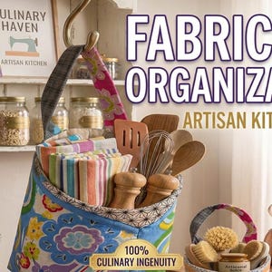May include: A fabric pod organizer with a blue, pink, and yellow floral pattern, featuring a hanging strap. It holds striped kitchen towels, wooden spoons, a whisk, and salt and pepper grinders. Text reads FABRIC POD ORGANIZATION! ARTISAN KITCHEN HAVEN and 100% CULINARY INGENUITY.