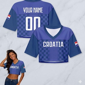 May include: Blue crop top jersey with the word "CROATIA" and the Croatian flag. The jersey has a checkered pattern and the text "YOUR NAME" and the number "00" on the back. The jersey has short sleeves.