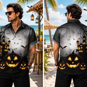May include: A short-sleeve button-down shirt featuring a Halloween-themed print with a haunted house, silhouettes of flying bats, bare tree branches, and three glowing jack-o'-lanterns against a gradient gray and black background.