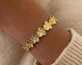 Bracelet jonc fleurs en acier inoxydable plaqué or, ajustable, tendance, best-seller, must-have, été 2026 | Pearly Shop