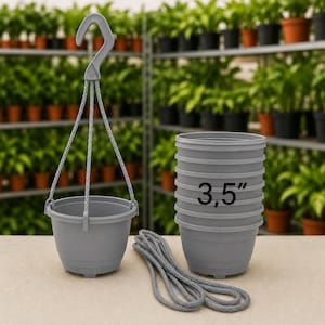 May include: A set of grey plastic hanging planters, each featuring a 3.5 inch diameter. The set includes one assembled planter with a hook and braided cord, a stack of identical empty planters, and an additional length of grey braided cord.