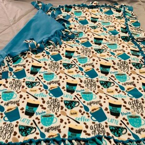 Coffee Fleece Tie Blanket Wrap yourself (or a loved one) in comfort with this handmade, no-sew fleece tie blanket!