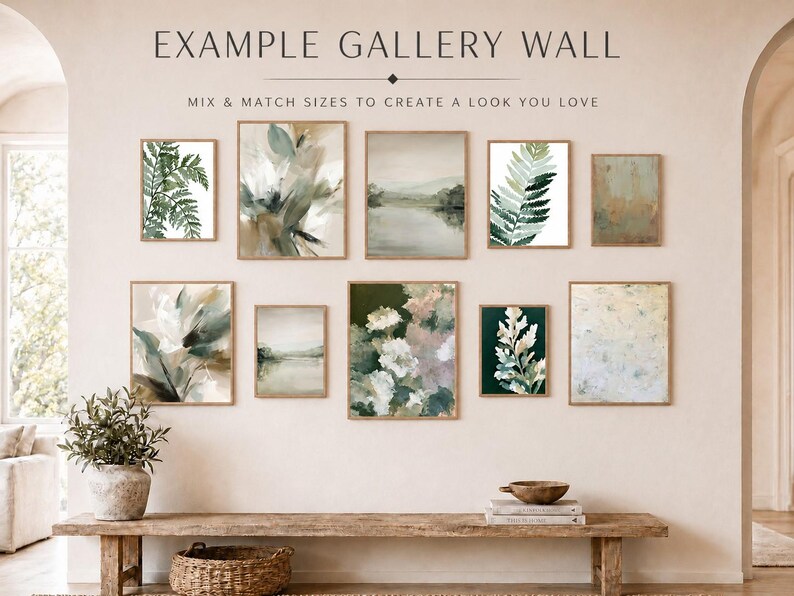 a gallery wall with nine framed artworks of varying sizes and styles, arranged in a visually appealing manner. The artworks include abstract paintings, landscapes, and botanical prints, creating a diverse and harmonious display.