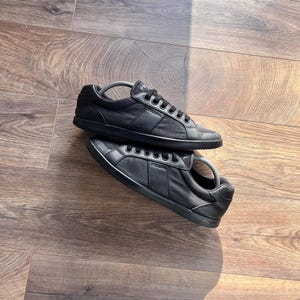 Prada 4E2845 svarta lädersneakers för män