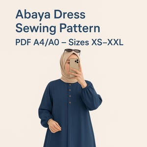 May include: Navy blue abaya dress sewing pattern. The image shows a woman wearing a navy blue abaya dress with long sleeves and a button-down front. The text on the image reads "Abaya Dress Sewing Pattern PDF A4/A0 - Sizes XS-XXL".