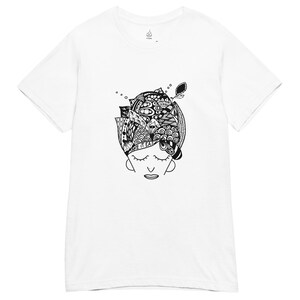 May include: White t-shirt featuring a black and white illustration of a person's face with closed eyes and an elaborate design on the head. The text "MAKE IT EASY" is visible on the design.