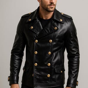 May include: A black double-breasted leather jacket featuring gold-toned buttons, a wide collar, shoulder epaulets, and two front flap pockets. The sleeves include adjustable cuffs with matching gold buttons, creating a structured look.