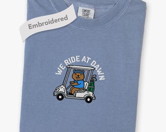 Embroidered Golf Shirt, Comfort Colors® Funny Golfer We Ride At Dawn Golfing Tee