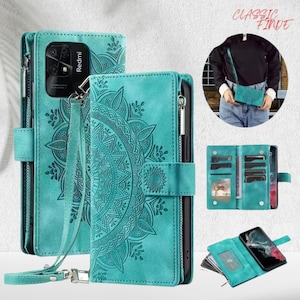 May include: Teal phone case with a mandala design and a wrist strap. The case has a zipper closure and a snap closure. The phone case is shown in multiple views, including a crossbody bag style. The text "CLASSIC FINDE" is in the upper right corner.