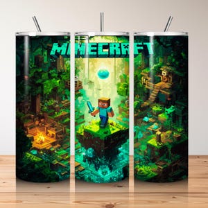 May include: A set of three stainless steel tumblers with a Minecraft-themed design. The design features a pixelated landscape with the word "Minecraft" in green block letters. Each tumbler has a straw and a detailed, colorful illustration.