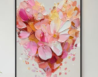 Op de afbeelding: Een ingelijst kunstwerk met een hartvormig bloemstuk. Het schilderij gebruikt roze, perzik en witte tinten, met getextureerde penseelstreken. Het kunstwerk staat tegen een neutrale achtergrond, wat een zachte, romantische uitstraling creëert.
