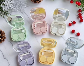 Kit de viaje para lentes de contacto, estuche portátil con espejo, pinzas, herramienta para extraer lentes y frasco de solución.