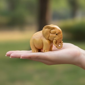Hand Carved Wooden Elephant Sculpture – Natural Wood Figurine