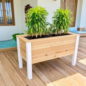 Step-by-step DIY raised planter box woodworking plans: build a sturdy, beautiful cedar garden bed (H 39.5" W 61", D 29") for patio, balcony, or backyard. Includes easy-to-follow PDF guide with detailed drawings, cut list, materials list (3x 2x4x8', 9x 1x6x6' cedar), and color-coded assembly instructions—perfect for growing vegetables, herbs, or flowers. Beginner-friendly, cost-effective, and designed to save 50% vs. store-bought planters. Instant download after purchase.