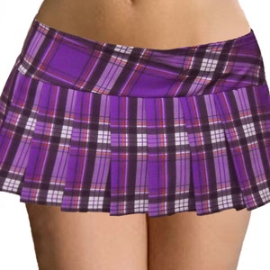 May include: A purple and white plaid mini skirt with pleats.