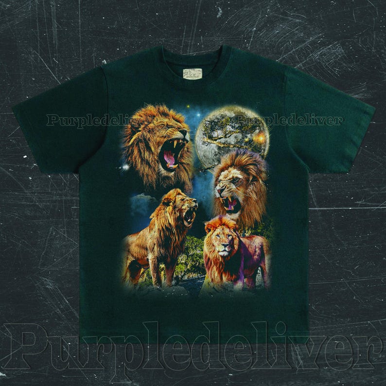 May include: Dark green t-shirt featuring a graphic of four lions with open mouths, set against a night sky with a full moon. The lions are depicted in shades of brown and orange, with detailed manes. The shirt has a classic crew neck.