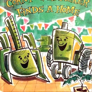 May include: A green book with the title "Corny Cornpicker Finds a Home" and a John Deere Storybook for Little Folks. The cover features a cartoon illustration of two green farm vehicles with smiling faces.