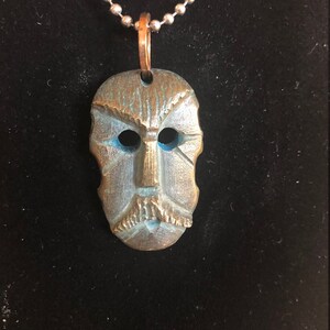 Face/Tribal Pendants