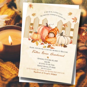 May include: A fall-themed baby shower invitation with a watercolor illustration. The design features pumpkins, autumn leaves, and a sleeping baby dressed as a pumpkin. The text reads "Fallon Reese Hazelwood" and event details.