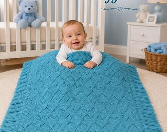 May include: A bright turquoise crocheted afghan blanket featuring a repeating heart pattern and long fringe along the side edges. The blanket displays the text Endless Hearts Afghan with decorative heart icons at the top and bottom of the script.