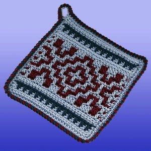 May include: A square, handmade crochet potholder with a geometric design. The potholder features a pattern of alternating red, light blue, and dark blue stitches. It has a loop for hanging and a red border.