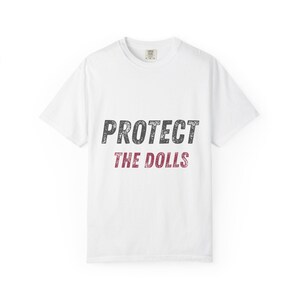 Protect The Dolls Unisex Garment-Dyed T-Shirt | Trendy Graphic Tee for Doll Lovers, Gift for Friends, Casual Wear, Anti-Violence