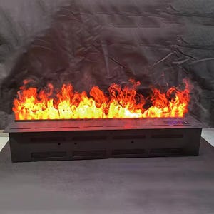 May include: A black electric fireplace with a realistic flame effect. The flames are a vibrant mix of yellow, orange, and red, creating a warm ambiance. The fireplace has a rectangular design with a vent at the bottom and control panel on the top.