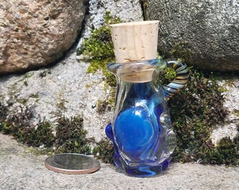 Handmade magic glass bottle, flamework glass made in michigan
