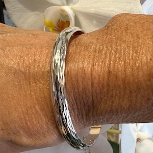 Etched Sterling Silver Bangle Bracelet: Hinged Design with Safety Chain