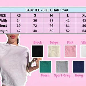 May include: A white baby tee with a size chart in centimeters. The chart lists sizes XS to XL, with measurements for width, chest, and length. Color options include black, beige, pink, white, green, sport grey, and navy.
