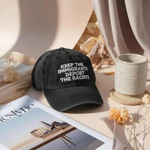 May include: A rustic wooden sign with the text "Welcome to our home" in white lettering. The sign features a distressed finish and a simple, inviting design, perfect for a front porch or entryway.