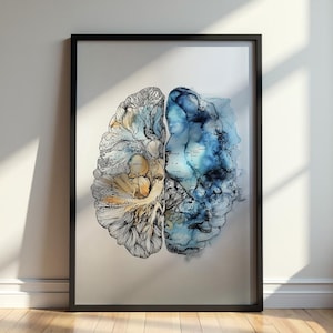 May include: Framed art print featuring a detailed illustration of a human brain. The artwork is split into two halves, one with intricate line drawings and the other with blue and yellow watercolor effects. The print is encased in a black frame.