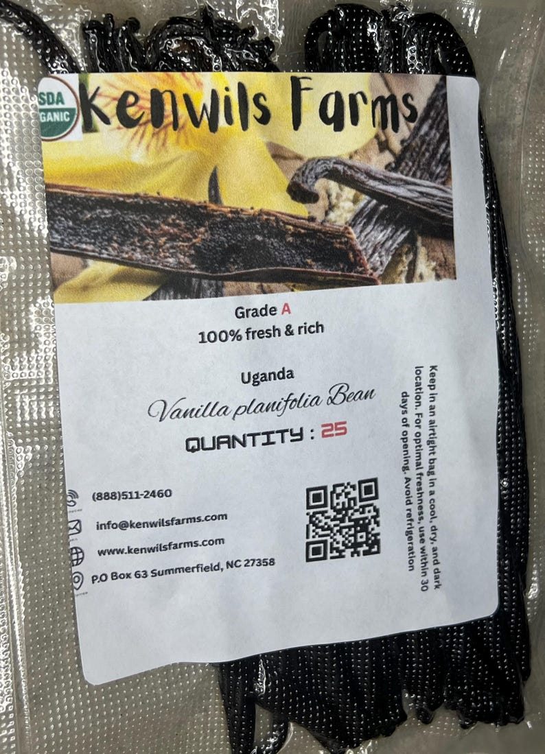 May include: A packet of Grade A vanilla beans from Kenwils Farms. The label states the beans are from Uganda, with a quantity of 25. The packaging includes contact details and a QR code.