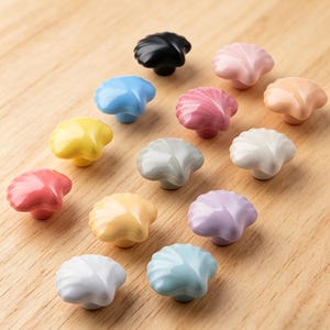 Pomelli per cassetti in ceramica a forma di conchiglia, maniglie per armadi e guardaroba a forma di conchiglia, armadi e cassettiere per bambini.