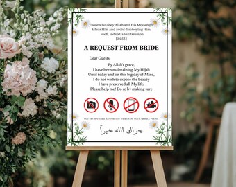 May include: A white sign on a wooden easel with text in English and Arabic. The sign reads "A Request From Bride" and includes a message asking guests not to take photos or videos. Floral border with daisies.