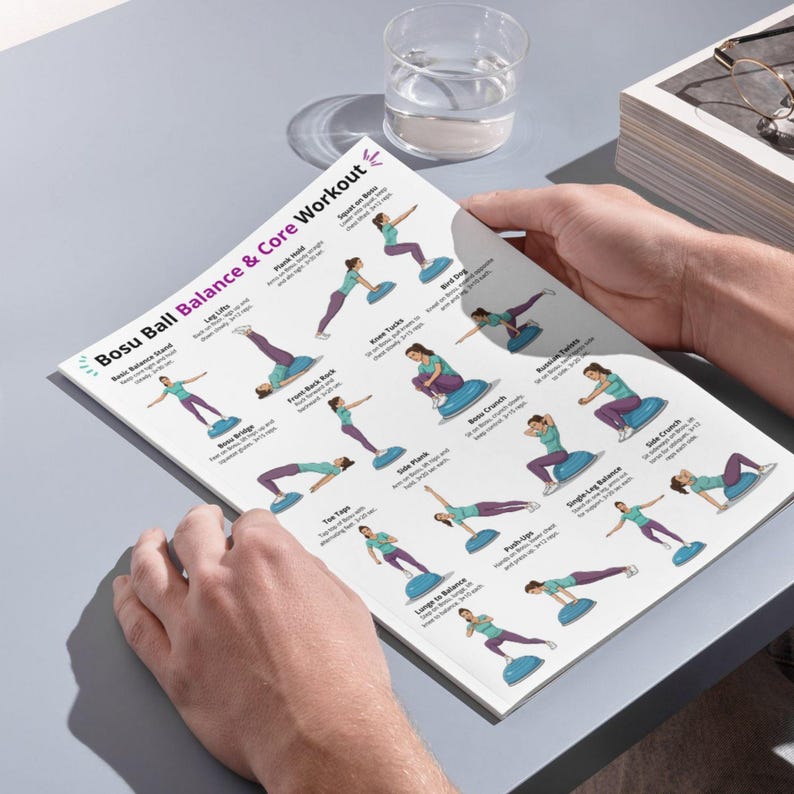 May include: A printed workout guide titled "Bosu Ball Balance & Core Workout" featuring illustrated exercises. The guide shows various exercises performed on a Bosu ball, with instructions. The color scheme includes teal, purple, and white.