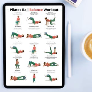 May include: A digital tablet displays a Pilates Ball Balance Workout guide. The guide features illustrated exercises with instructions, including Seated Balance, Mini Ball Toe Tap, and Donkey Kick. The tablet is on a white surface, next to a pen and a cup of coffee.