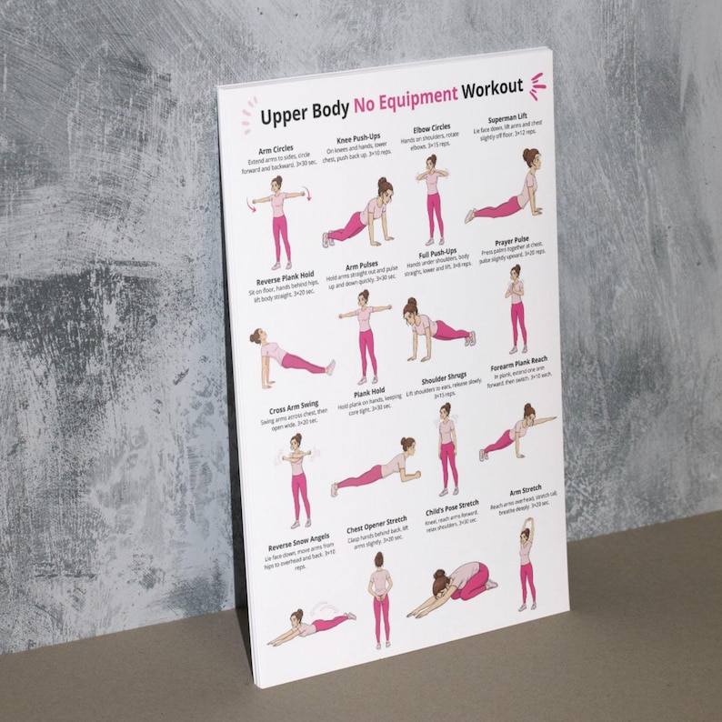 May include: A white poster displaying an "Upper Body No Equipment Workout" with exercise illustrations. Exercises include arm circles, knee push-ups, and plank hold. The poster is propped against a grey wall.
